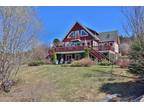 Unique, charming 4300 sq foot cottage with wharf and cookhouse right on the