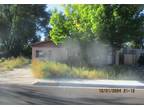 Foreclosure Property: E 16th St