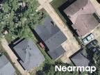 Foreclosure Property: E 8th St